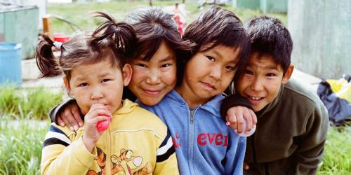 four young children together