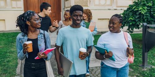 A group of primarily black students walking together