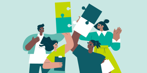 teachers working on a puzzle